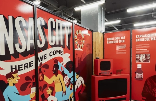 Museum display will with people celebrating under Kansas City here we come; models of televesions and displays