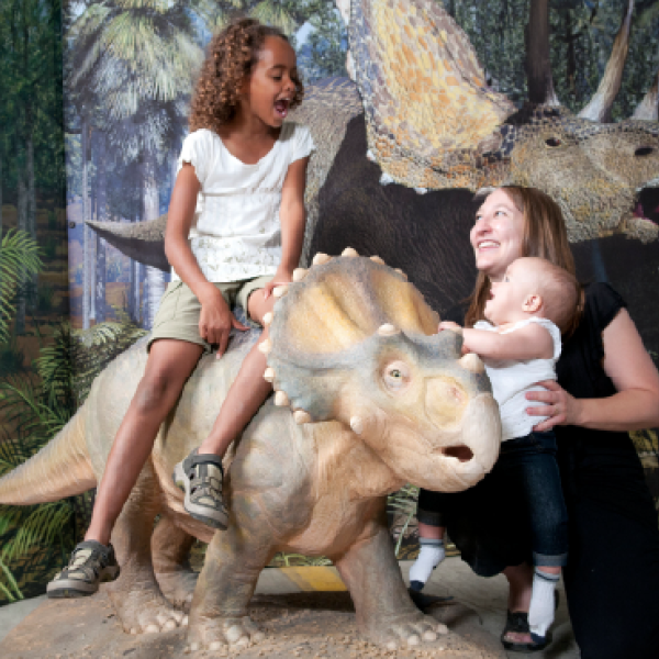 kids, mom and dinosaur