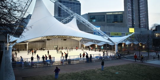 View of Ice Skating Rink with Buildings in Background